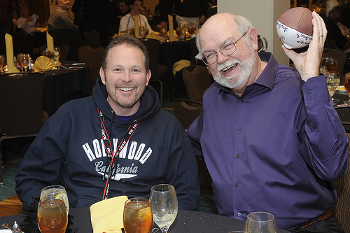 From left, assistant band director Matt Henley and WCU alumnus John Anderson catch up during the celebration of the arrival of 2011.